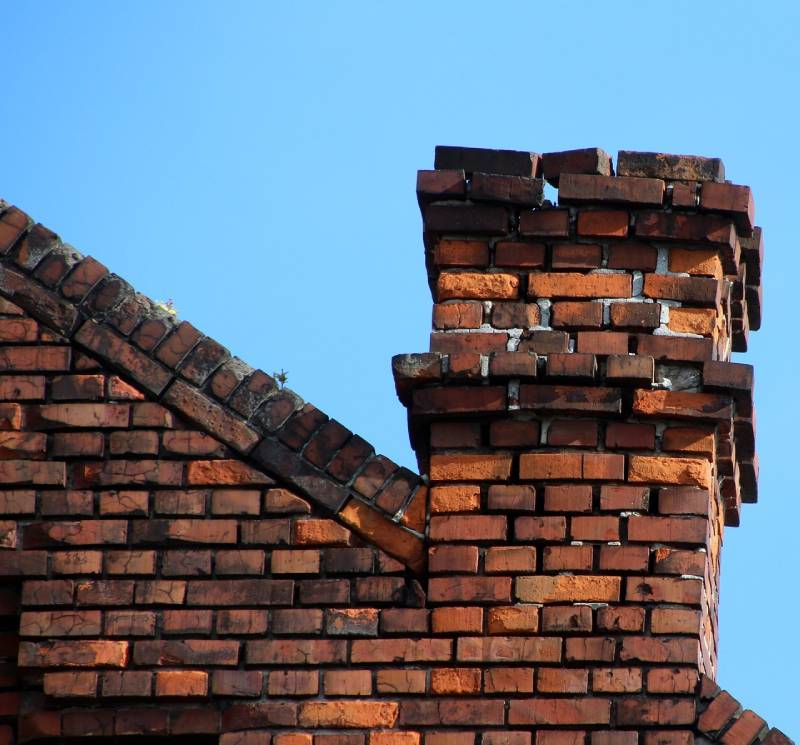 Damaged chimney on an Topanga Canyon home showing cracks and missing mortar